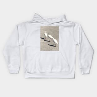 Three pelicans by the river Kids Hoodie